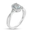 Zales Oval Aquamarine And 1/15 Ct. T.W. Diamond Frame Twist Shank Ring In 10K White Gold Rings