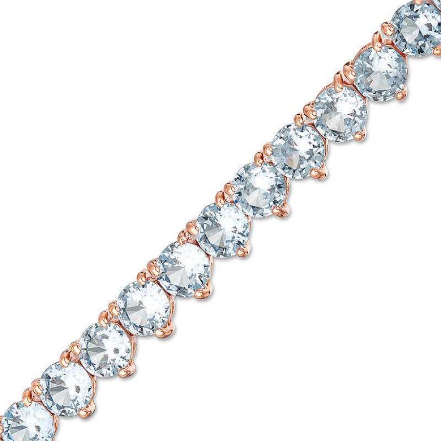 Zales Simulated Aquamarine Tennis Bracelet In Sterling Silver With 14K Rose Gold Plate - 7.25" Bracelets