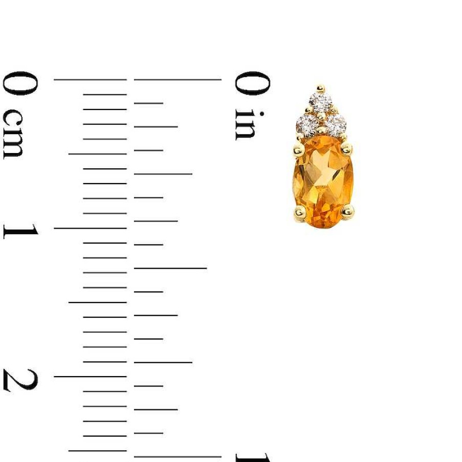 Zales Oval Citrine And 1/10 Ct. T.W. Diamond Stud Earrings In 10K Gold Earrings