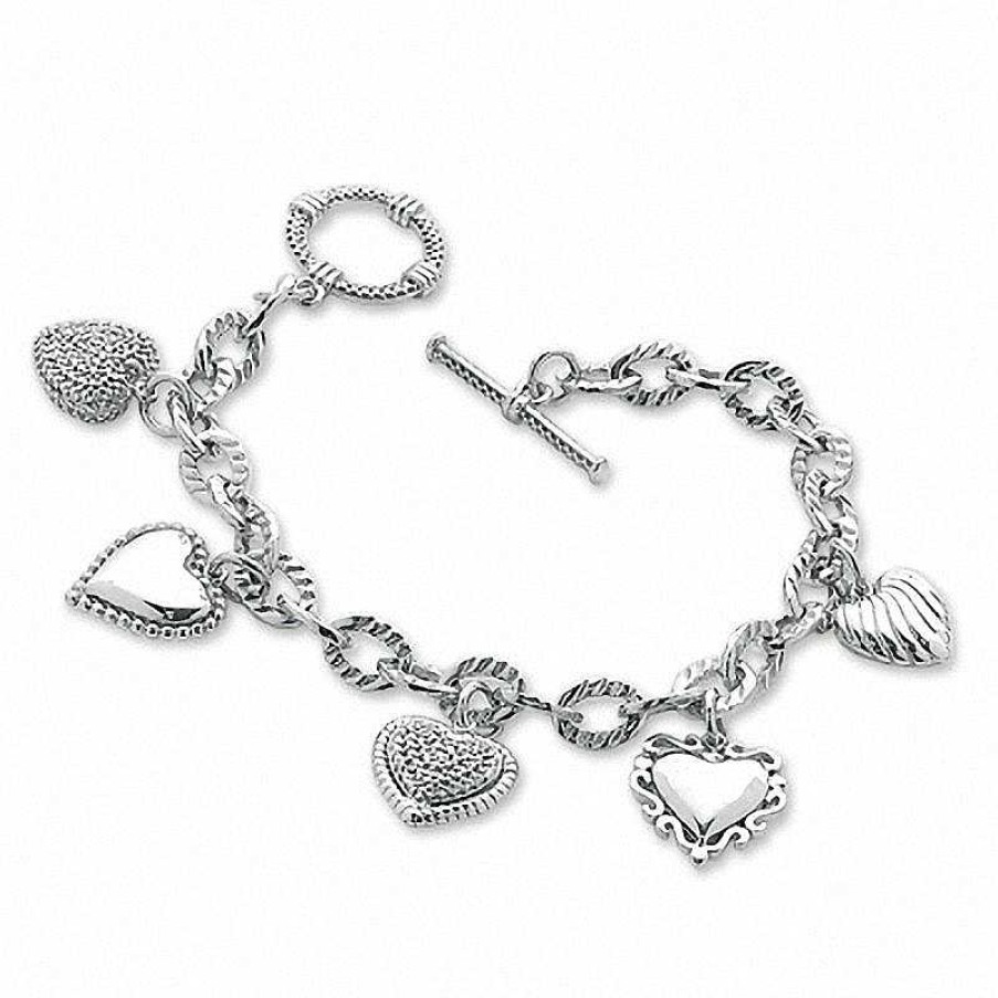 Zales 1/5 Ct. T.W. Diamond Heart Assorted Charm Bracelet In Sterling Silver Bracelets