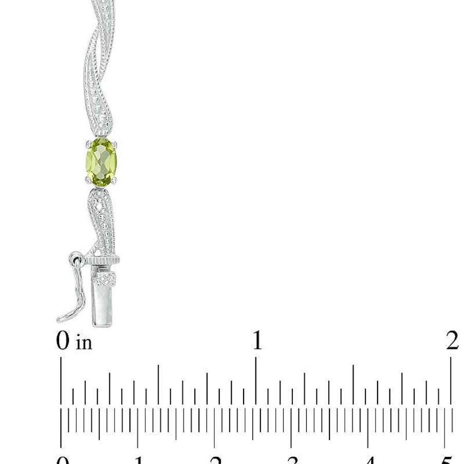 Zales Oval Peridot Bypass Link Bracelet In Sterling Silver - 7.25" Bracelets