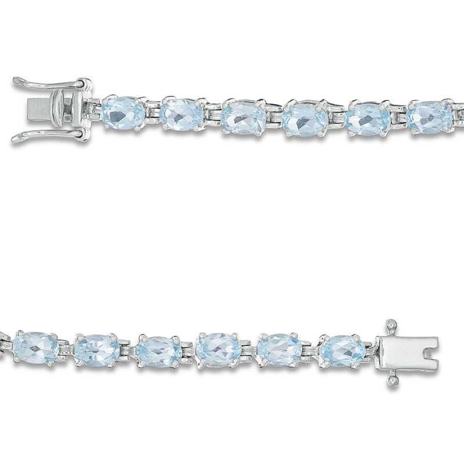 Zales Sideways Oval Blue Topaz Tennis Bracelet In Sterling Silver - 7.5" Bracelets