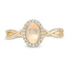 Zales Oval Opal And 1/15 Ct. T.W. Diamond Frame Twist Shank Ring In 10K Gold Rings