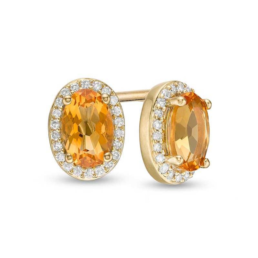 Zales Oval Citrine And 1/10 Ct. T.W. Diamond Frame Stud Earrings In 10K Gold Earrings