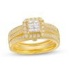 Zales 3/4 Ct. T.W. Quad Princess-Cut Diamond Frame Bridal Set In 10K Gold (I/I2) Rings