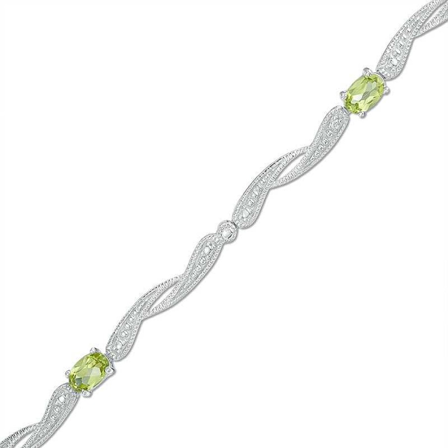 Zales Oval Peridot Bypass Link Bracelet In Sterling Silver - 7.25" Bracelets