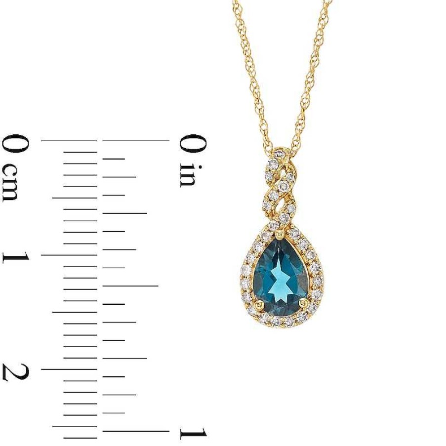 Zales Pear-Shaped London Blue Topaz And 1/8 Ct. T.W. Diamond Frame Twist Pendant In 10K Gold Necklaces