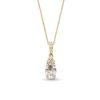 Zales Oval White Lab-Created Sapphire And 1/15 Ct. T.W. Diamond Pendant In 10K Gold Necklaces