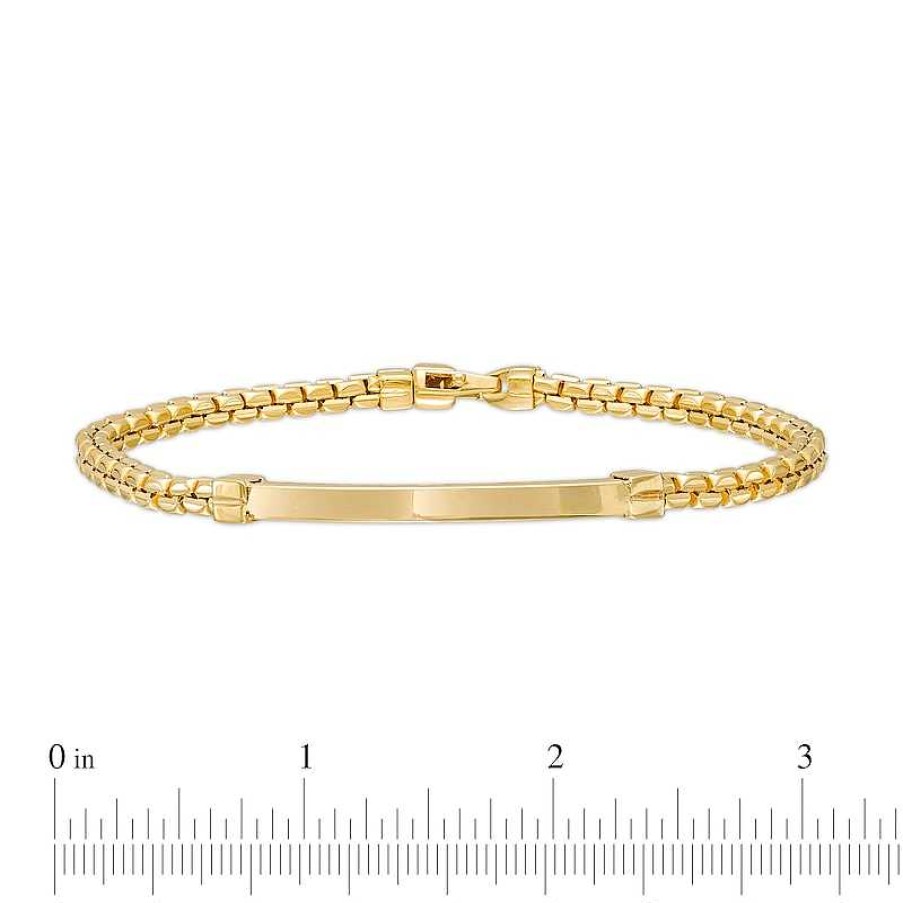 Zales Men'S Curved Id Link Bracelet In 10K Gold 9" Bracelets